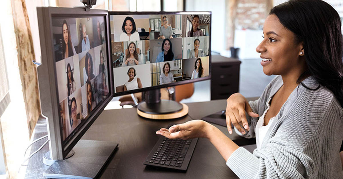 Woman in a virtual work meeting on web camera