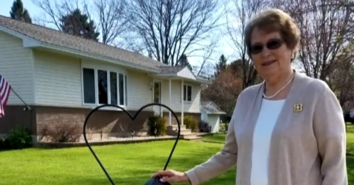 Mary Gryzwa stands outside her home in Peshtigo, Wisconsin.
