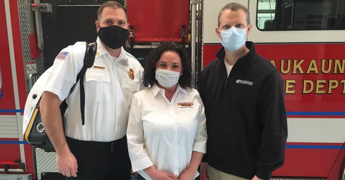 From left: Kaukauna Fire Chief Andrew Bertges, Firehouse Subs franchise owner Sheila Brenwall and BayCare Clinic emergency medicine physician Dr. Ryan Murphy.