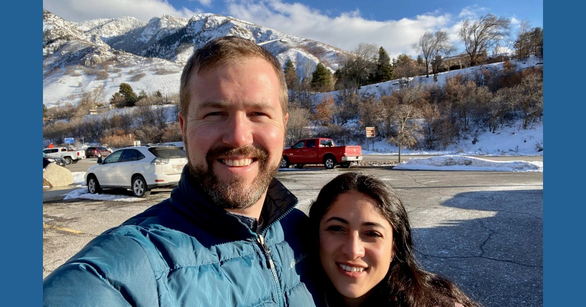 Dr. Jon Slezak, an otolaryngologist with BayCare Clinic, poses with his significant other with a mountain in the background