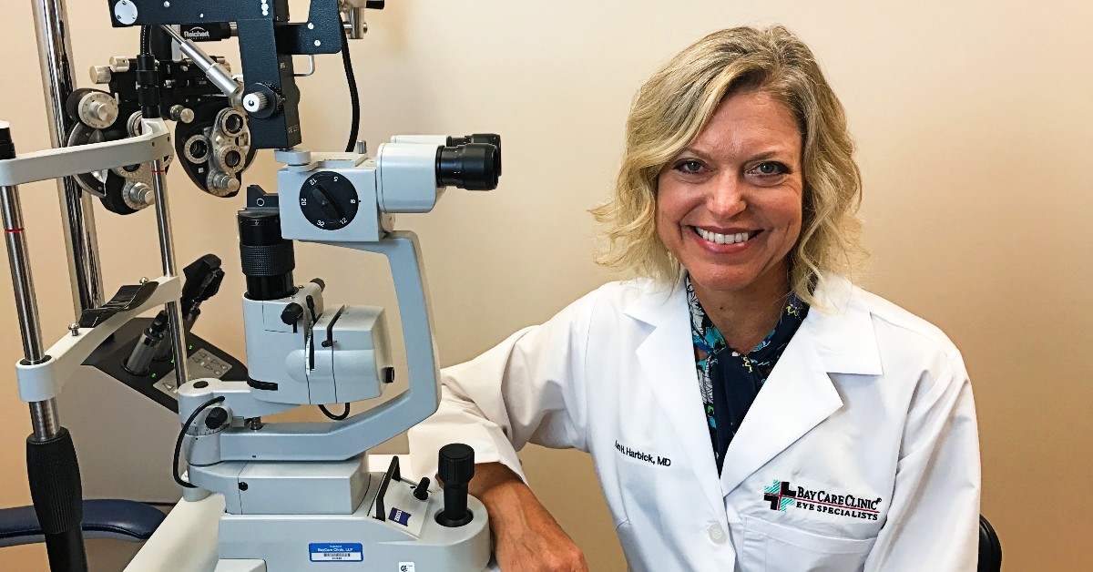 Dr.  Harbick by eye exam equipment