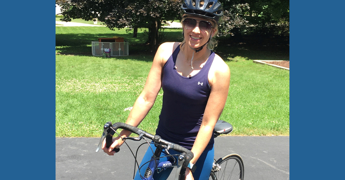 Dr. Mary Rupp of BayCare Clinic poses on her bicycle