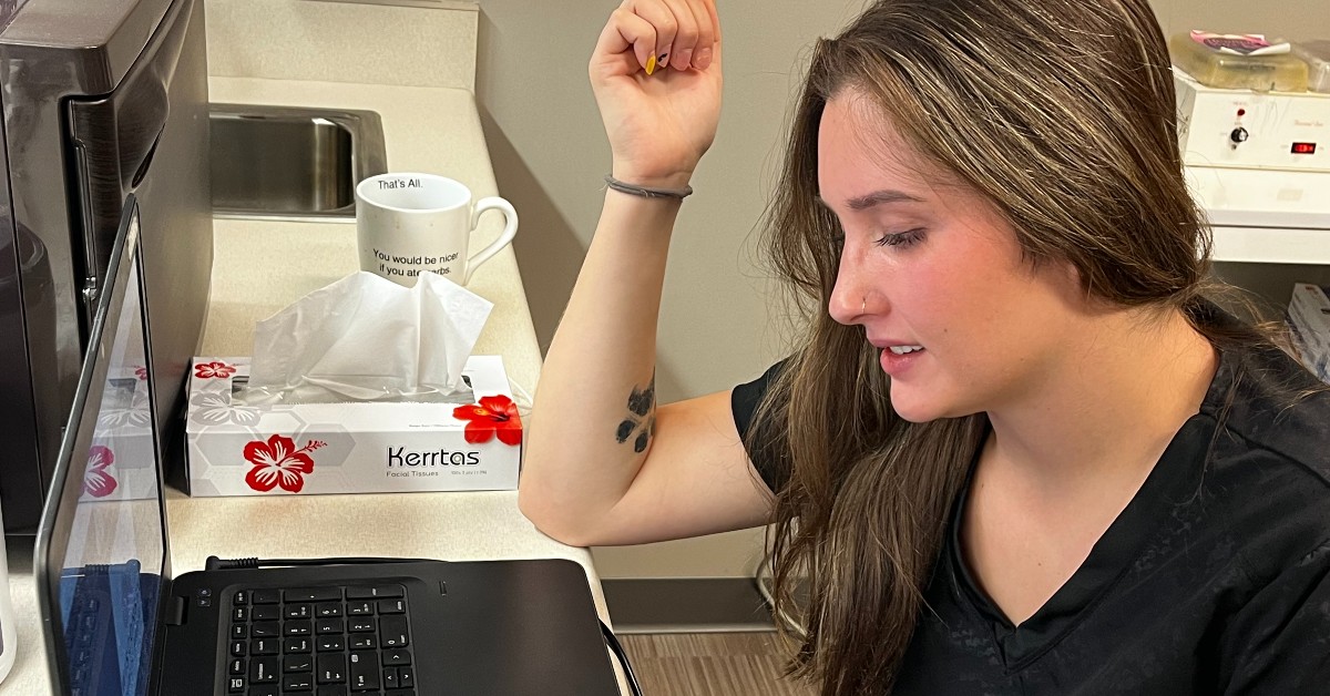 Caitlin Romenesko, a medical aesthetician with Plastic Surgery & Skin Specialists by BayCare Clinic, speaks remotely with Wisconsin Public Radio.