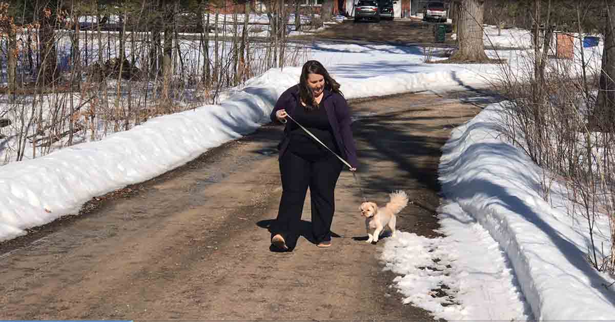 Anne Laurent walking her dog