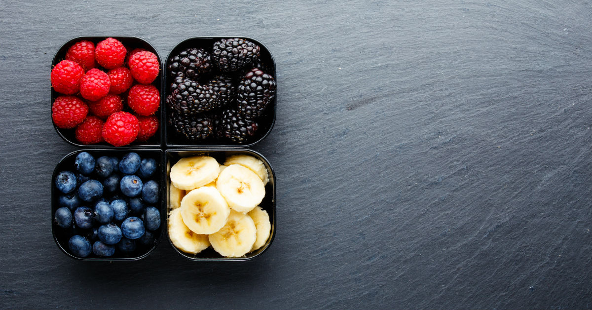 Raspberries, blackberries, blueberries and bananas